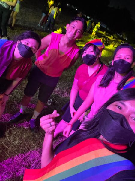 Sam attending Pride March with her friends and her girlfriend